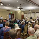 Gil Almquist speaks at the Town Hall