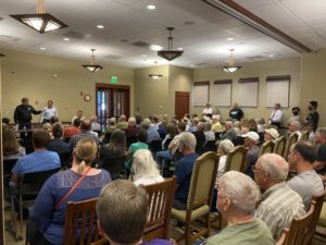 Gil Almquist speaks at the Town Hall