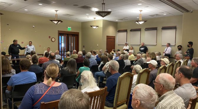 Gil Almquist speaks at the Town Hall